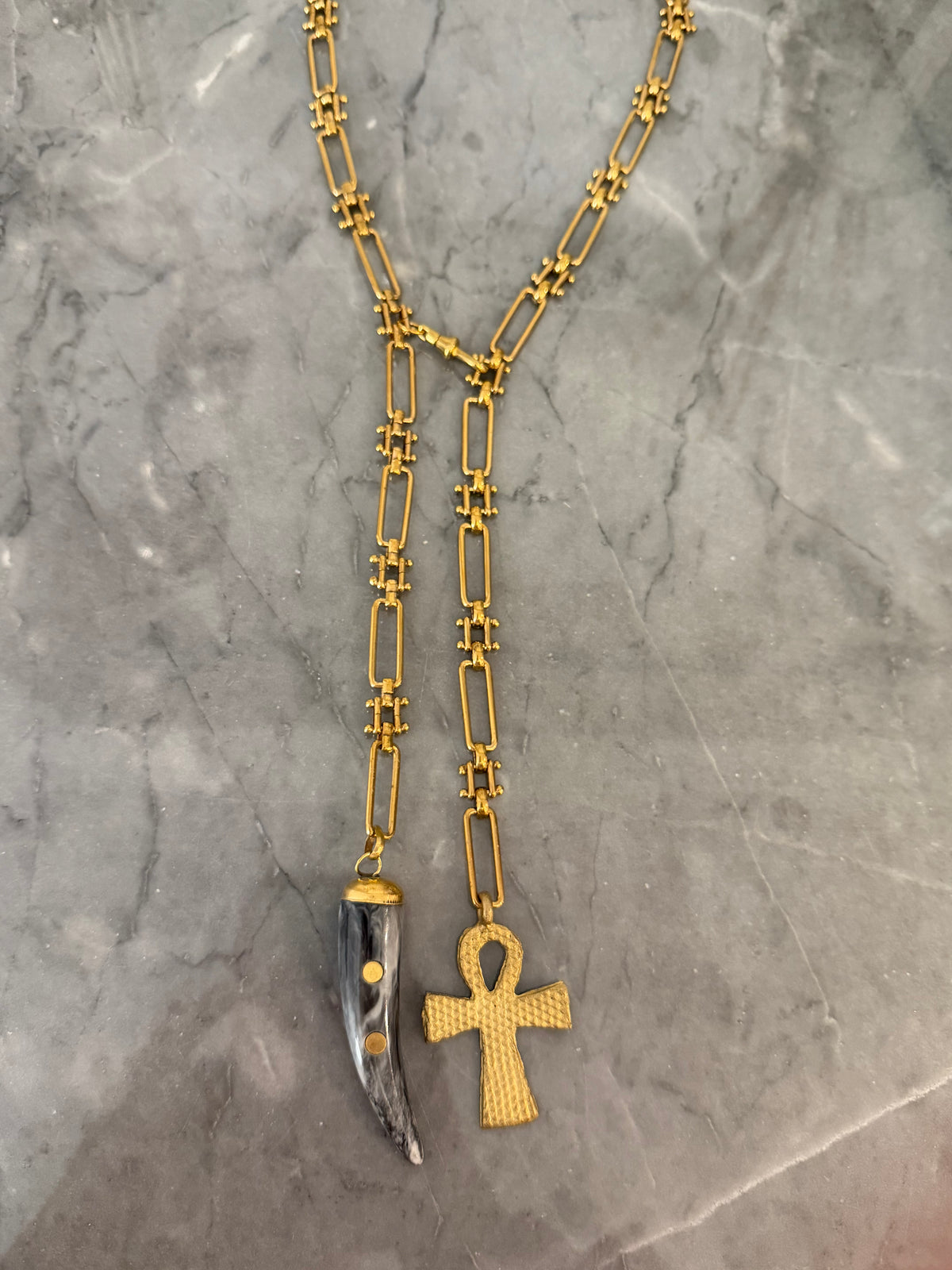 up and down cross horn necklace