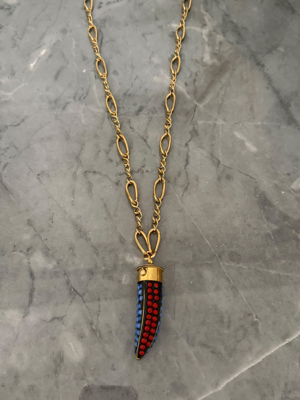 long red and blue horn chain