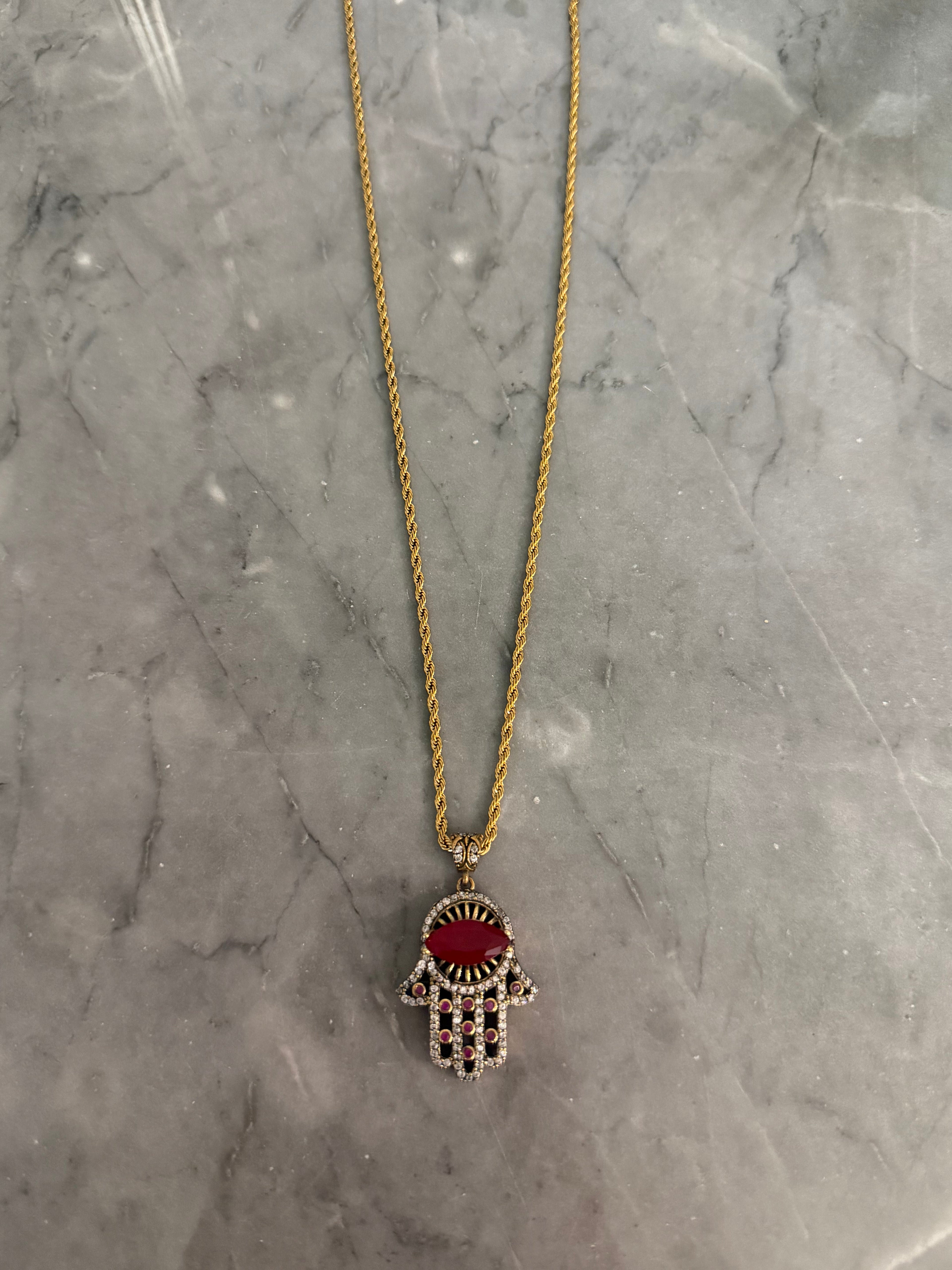 long old red hand necklace
