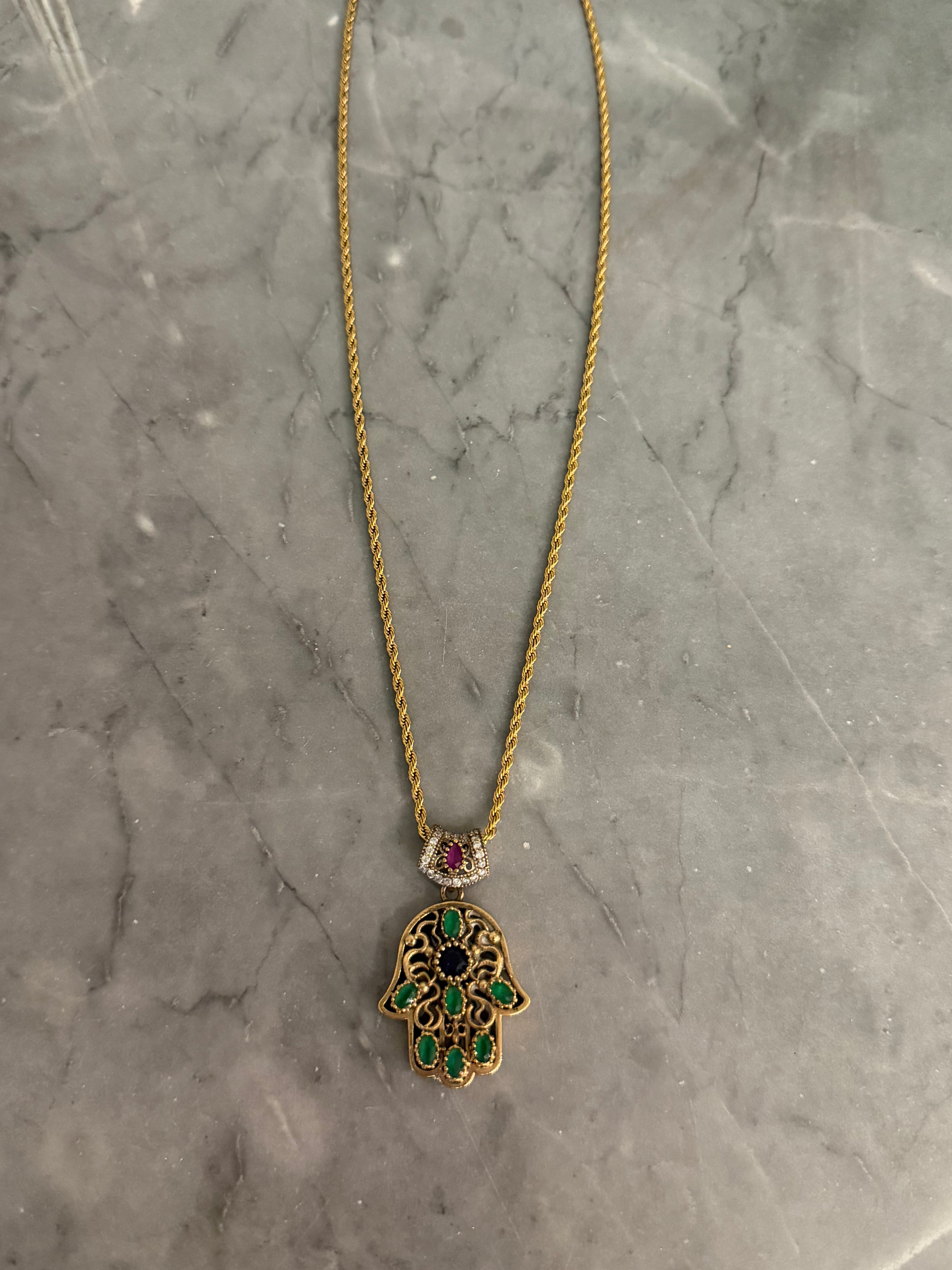 green old hand necklace