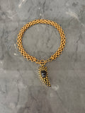 tiny choker gold black horn