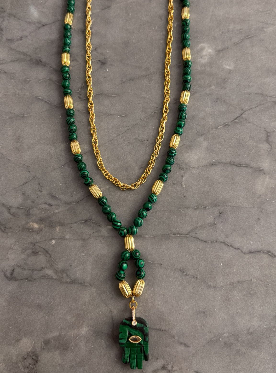 green hand stone necklace